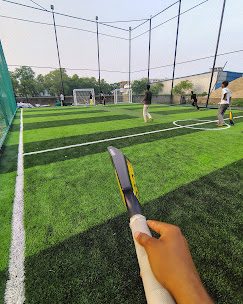 Cricket bat in action at The Turf X