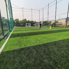 Players in action on The Turf X football turf