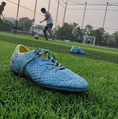 Football boot on the turf at The Turf X