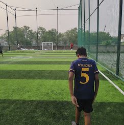 Player on the football turf at The Turf X